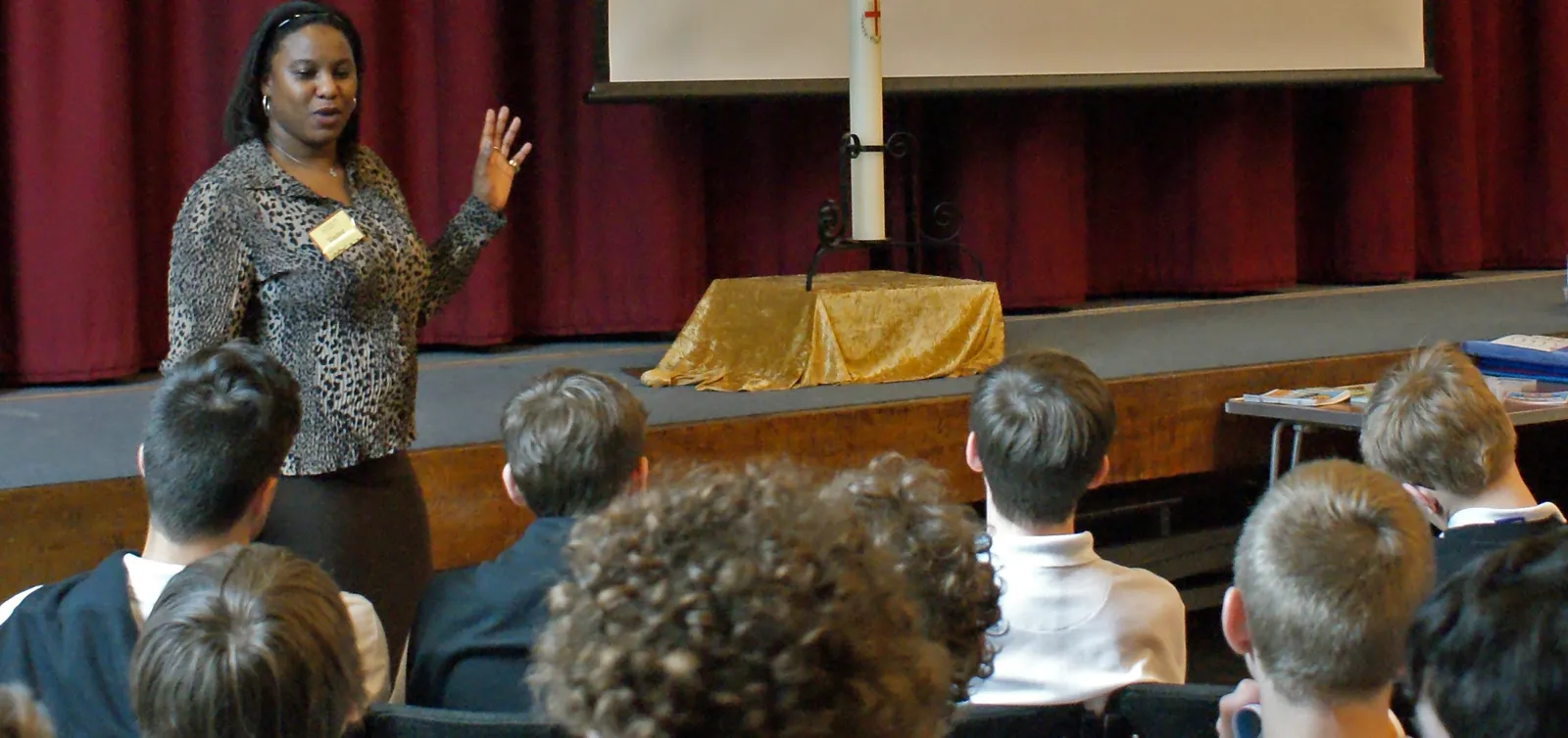 Olive Pellington speaking at a school assembly