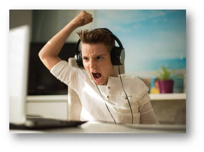 A frustrated student shouting at their laptop while trying to study